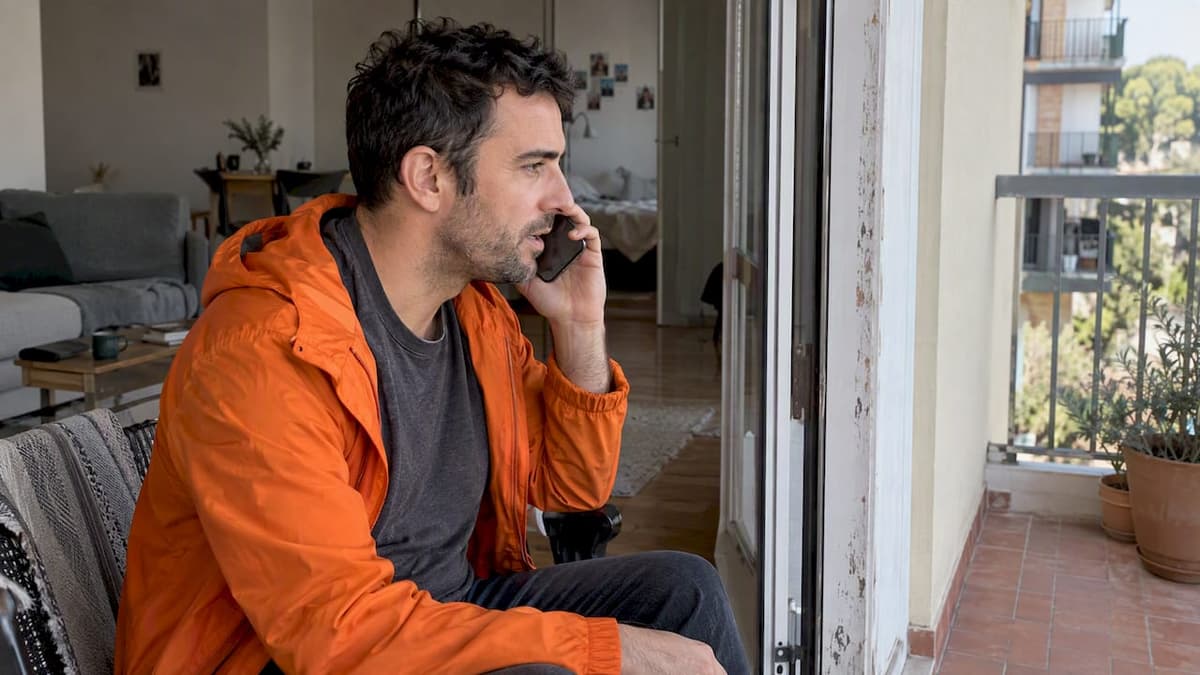 Expat placing a call from a new home